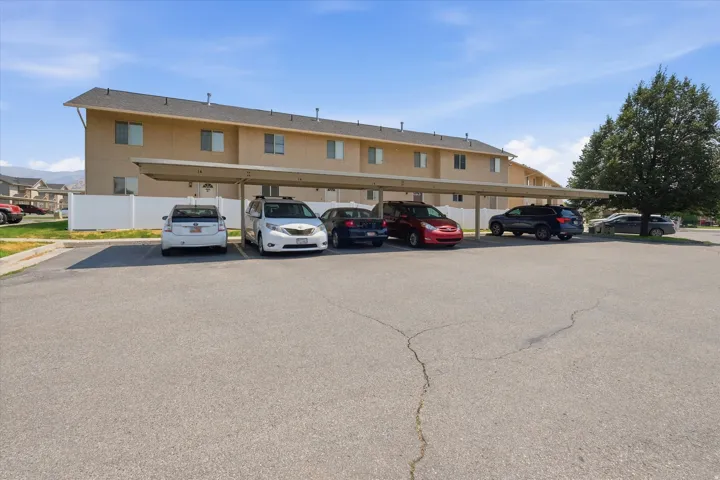 Covered parking structure with multiple spaces