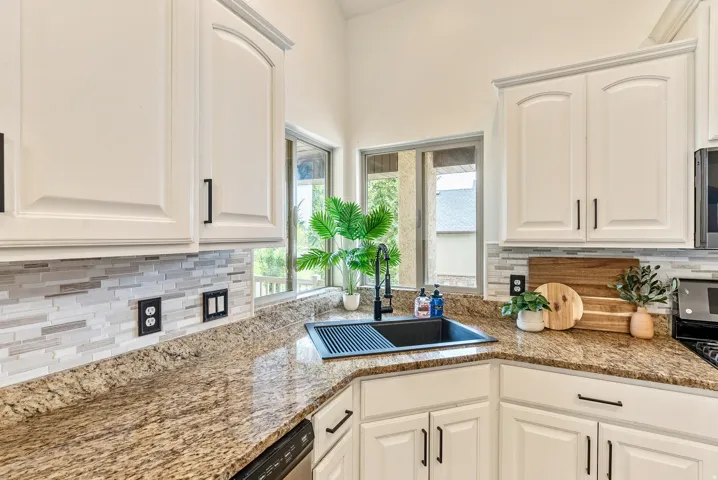 White cabinetry with black hardware