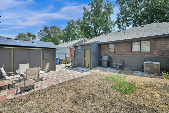 Brick exterior with painted lower foundation