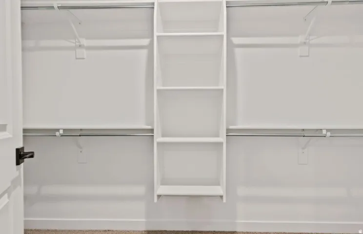 White built-in shelving with multiple storage levels