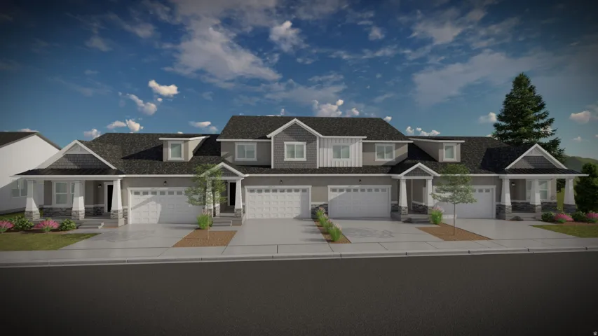 Contemporary townhomes with contrasting siding and stone veneer accents