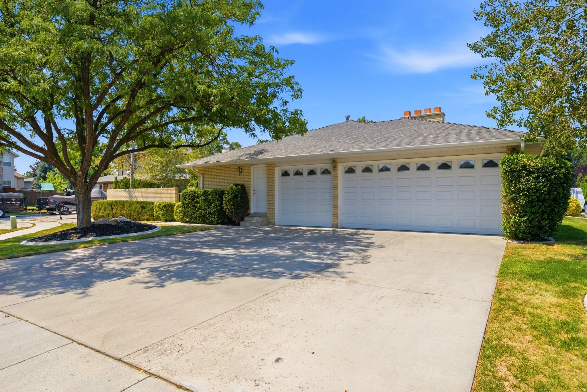 3 Car garage equipped with a heater
