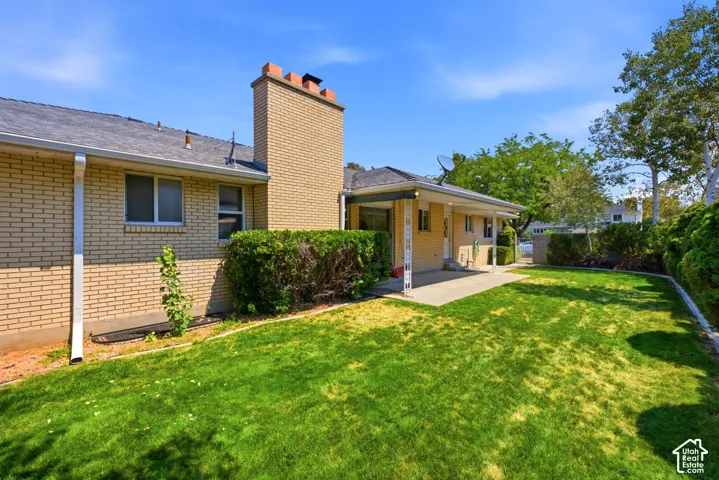 Fully landscaped yard with mature trees