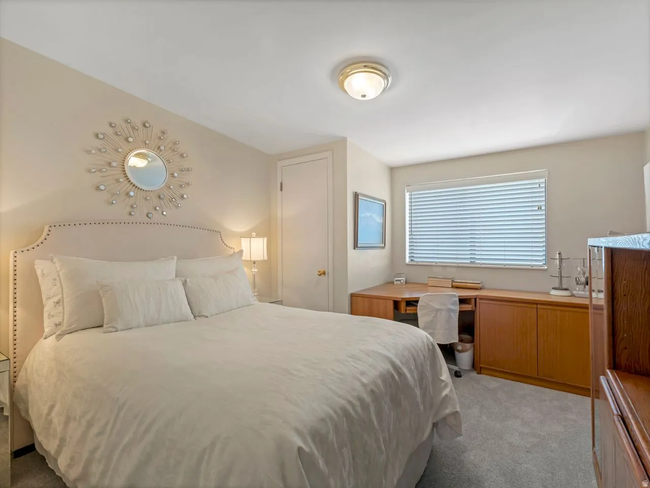 Wall-to-wall carpeting and neutral wall tones