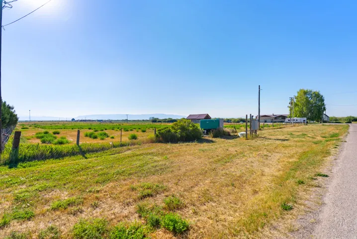 Expansive land parcel with surrounding agricultural fields