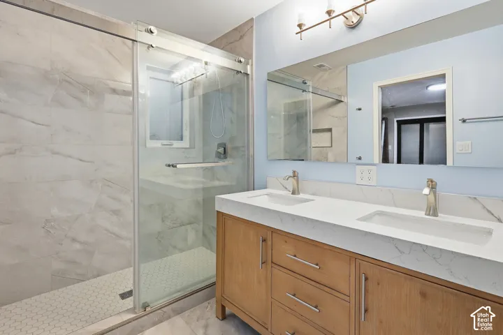Dual vanity with undermount sinks and modern faucets