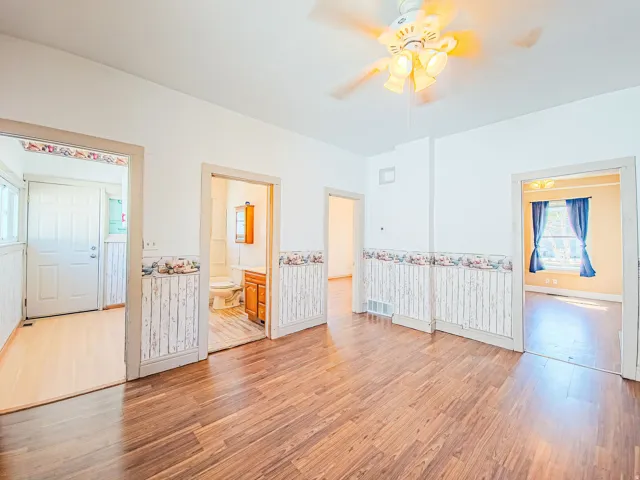 Wood-finish flooring throughout the main area