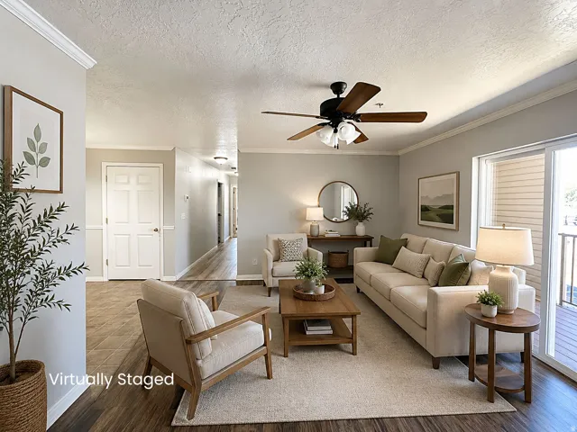 Wood-finish flooring, crown molding, ceiling fan, sliding glass door, and white paneled interior doors