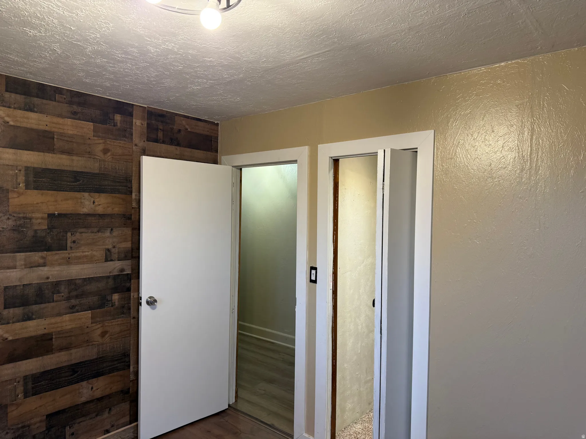 Feature wall with wood-finish paneling
