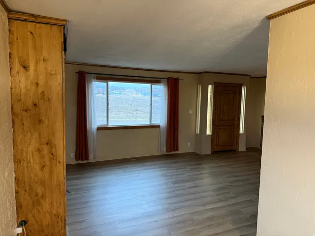 Wood-finish flooring throughout