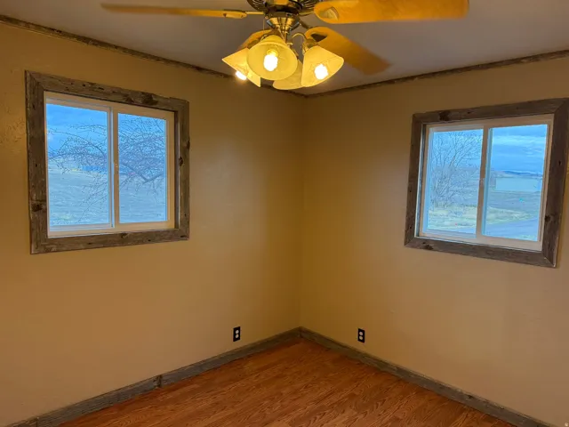 Warm-toned walls with wood-finish flooring