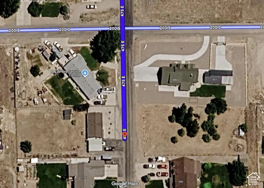 Aerial Map. Displaying the property's location and surrounding area with identified addresses and businesses