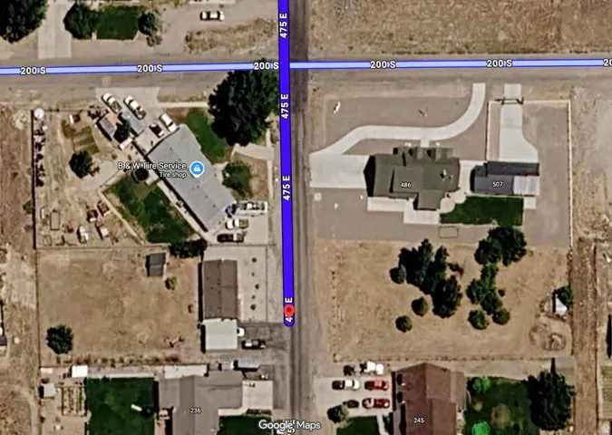 Aerial Map. Displaying the property's location and surrounding area with identified addresses and businesses