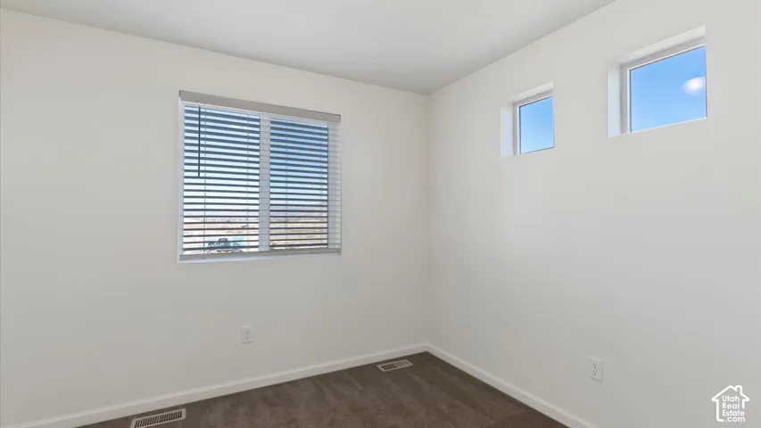 Wall-to-wall carpeting and neutral wall finishes