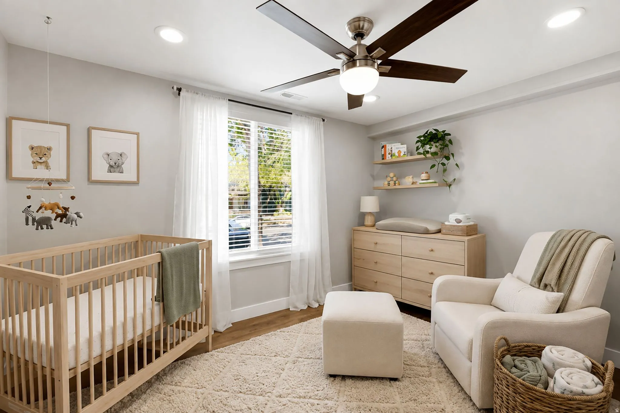 Recessed ceiling lighting, wood-finish flooring, a ceiling fan with integrated lighting, and a window with blinds