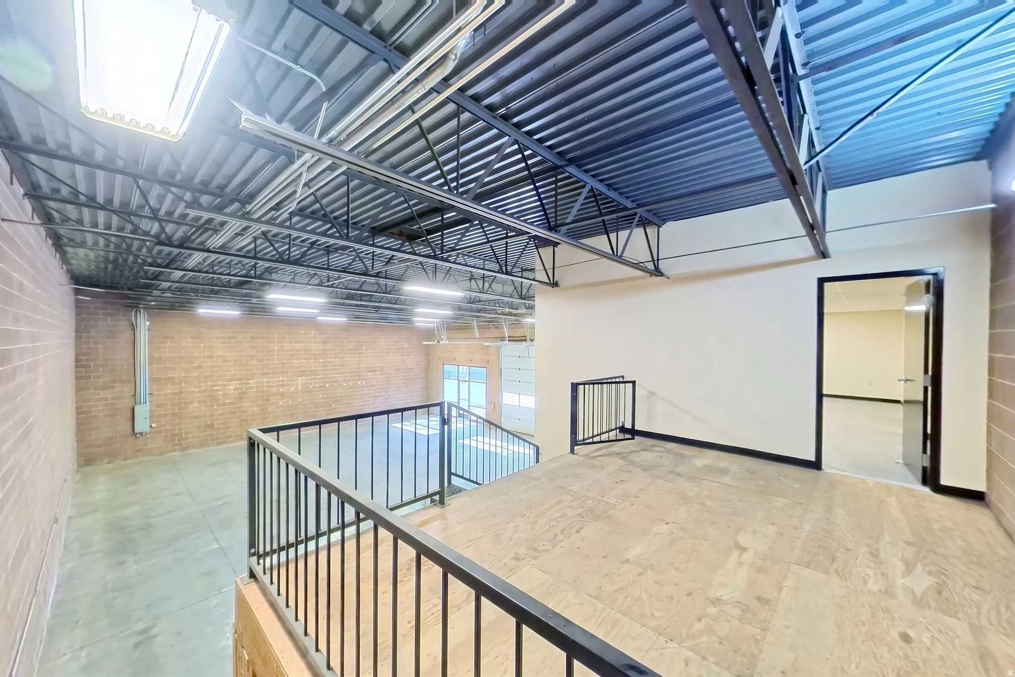 Loft landing connecting warehouse to upper-level office