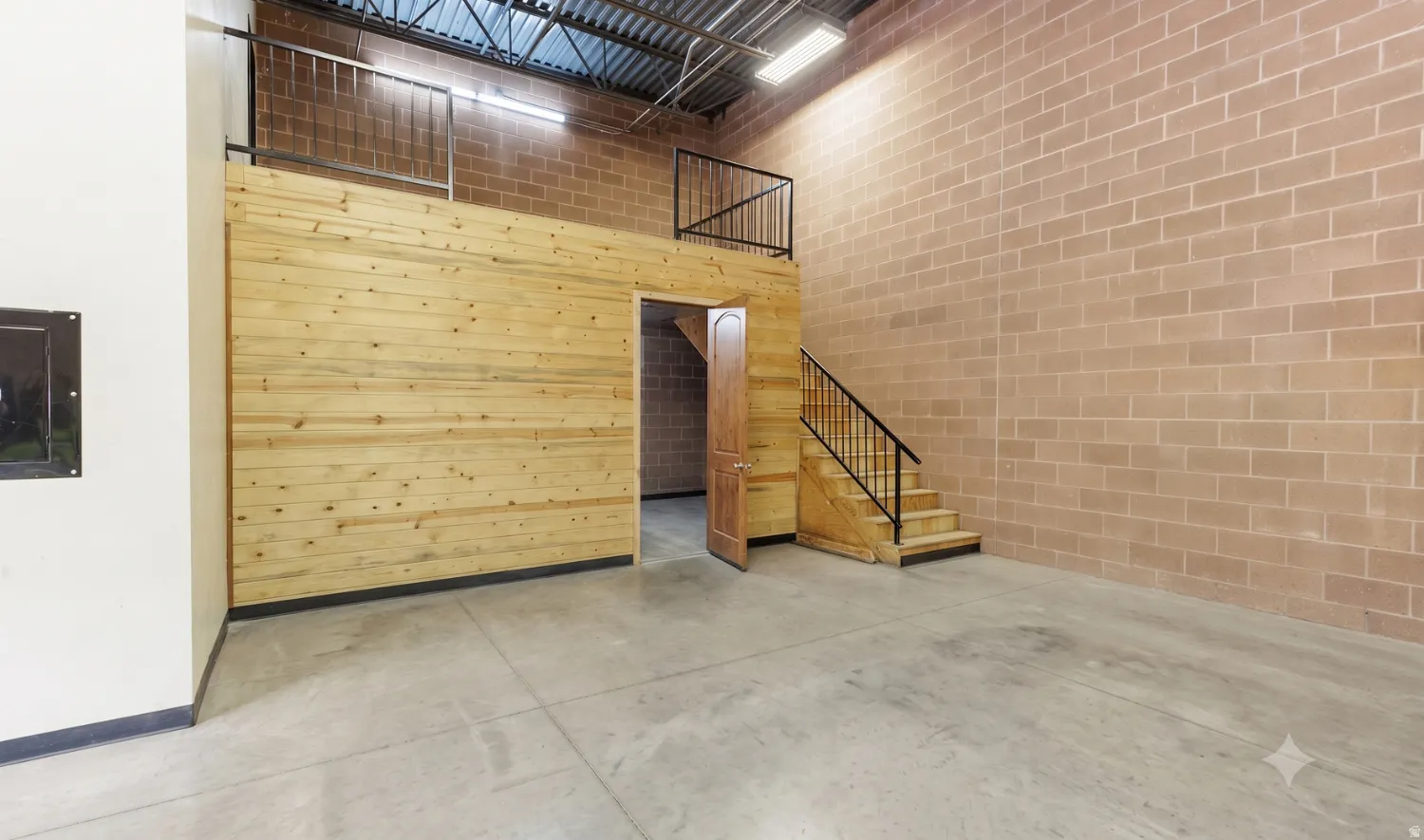 Mezzanine and stairs to upper level office