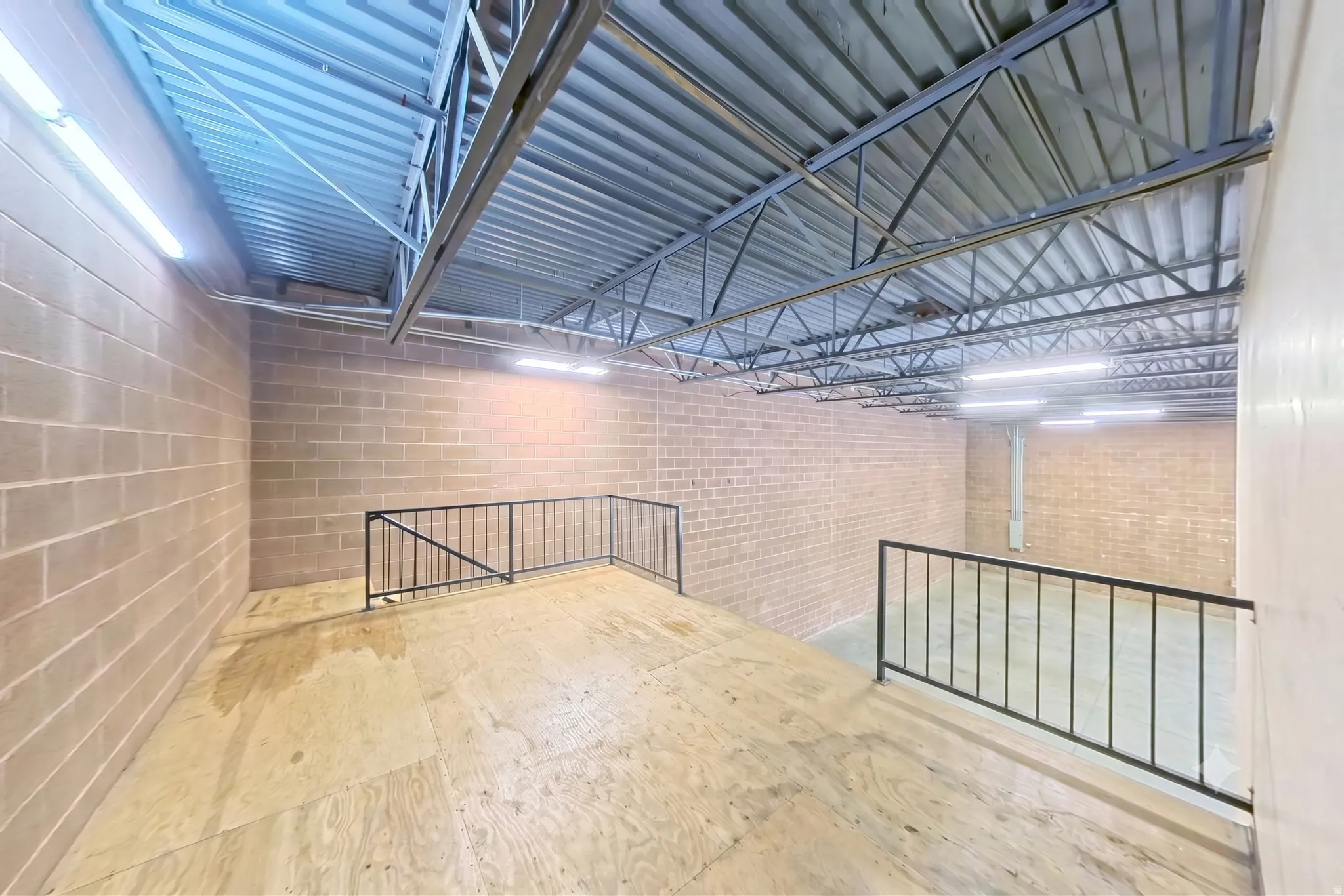Mezzanine platform — 695 SF upper level