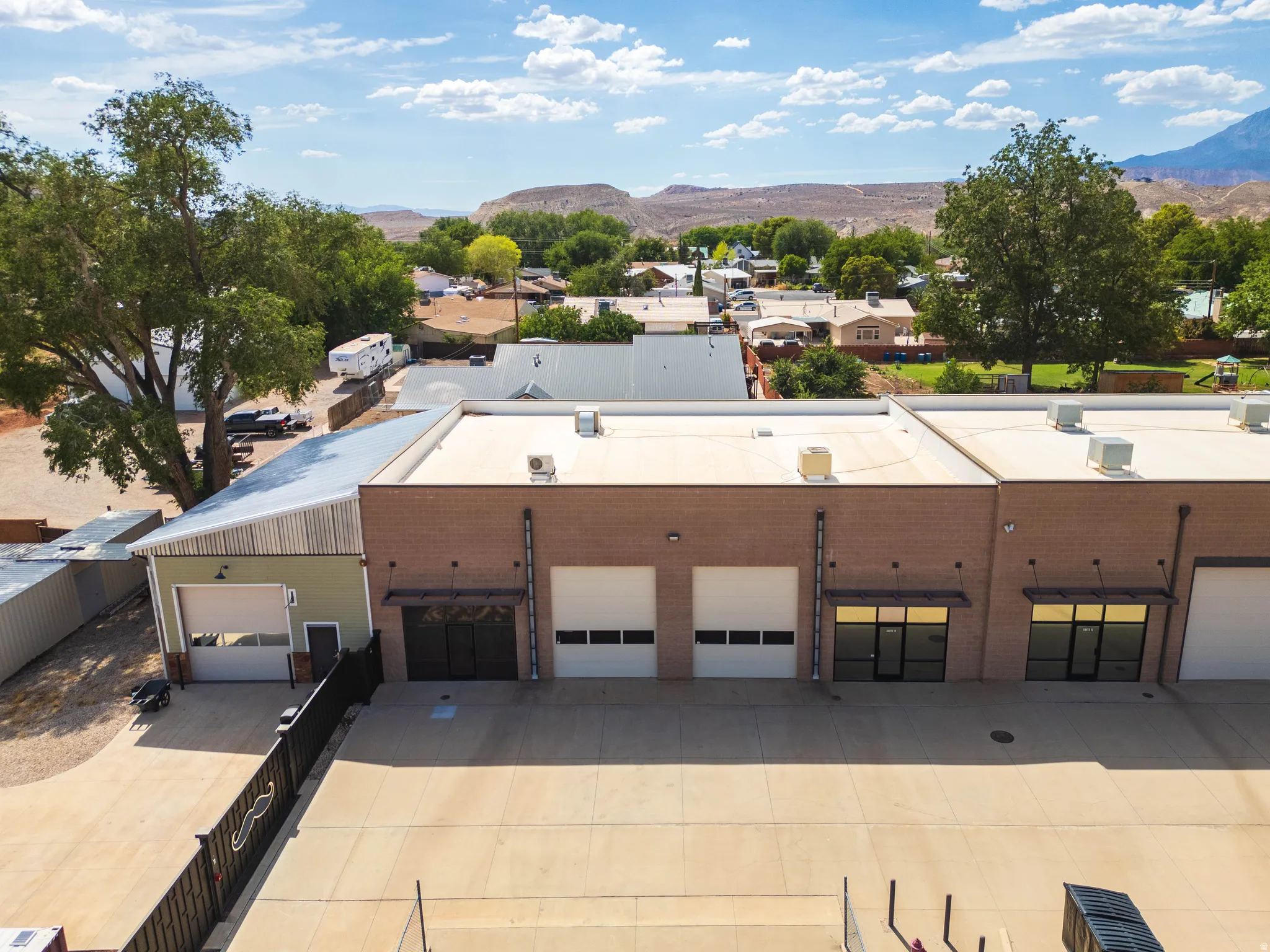 Building frontage — concrete apron and drive-in doors