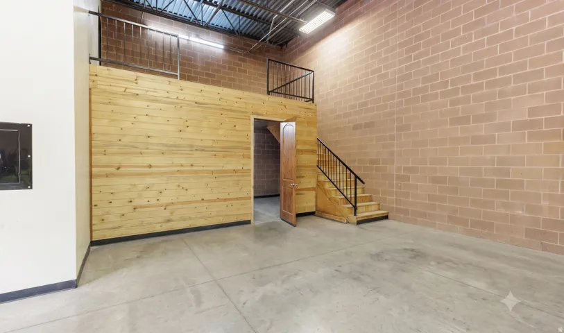 Mezzanine and stairs to upper level office