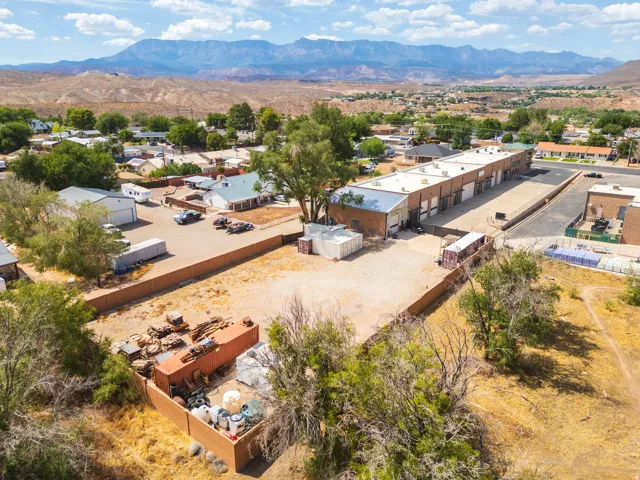 Aerial — full site and gated yard