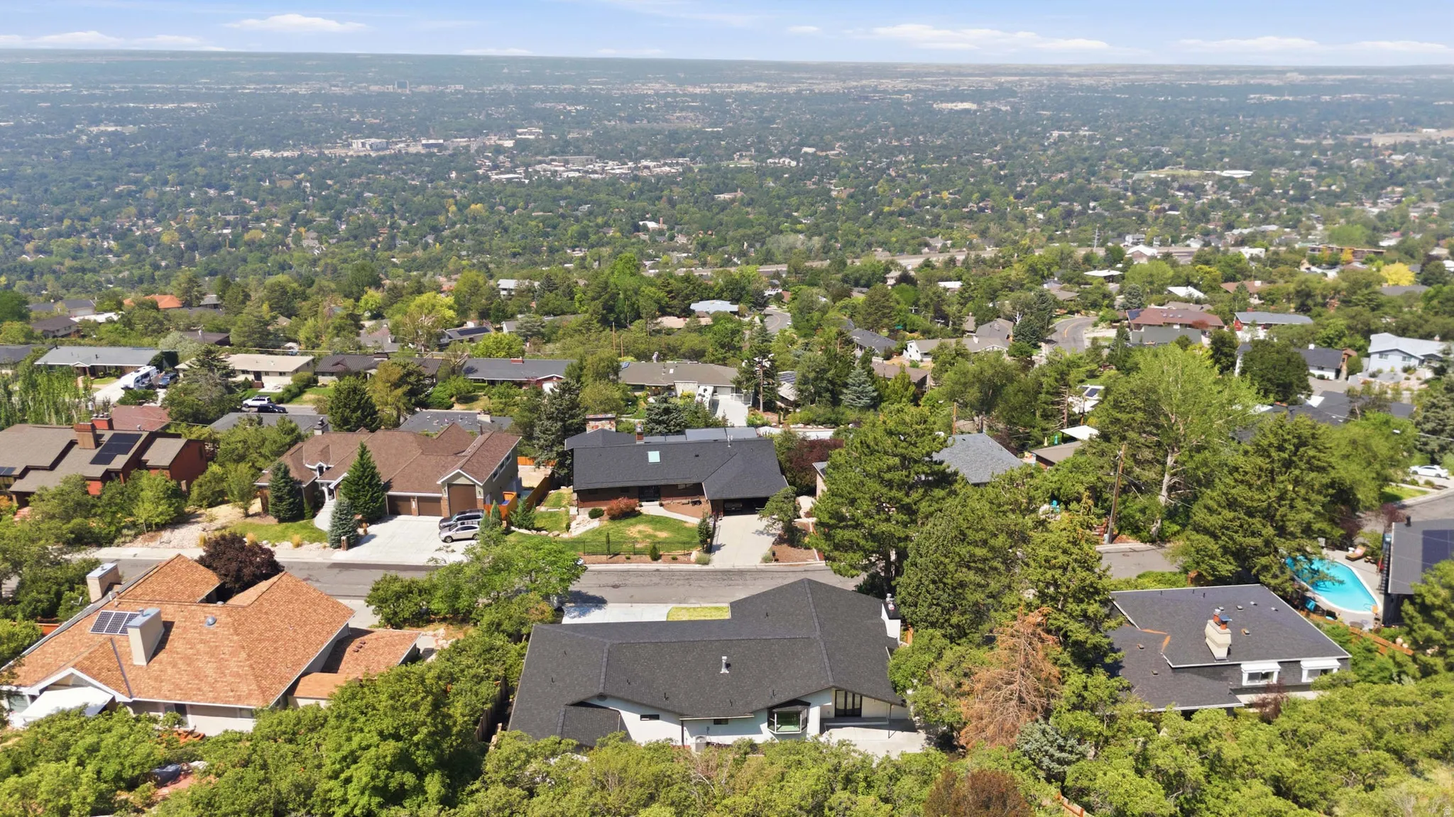Expansive residential area with numerous rooftops