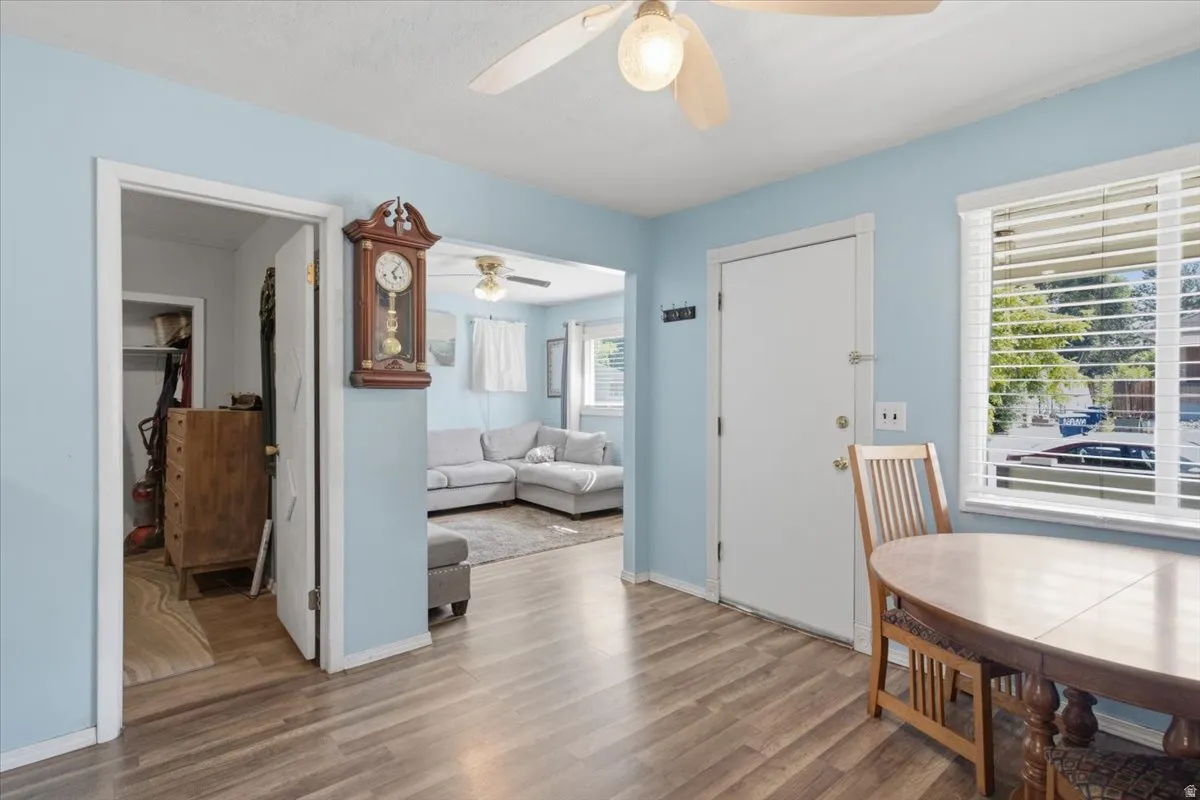 Light blue interior walls with wood-finish flooring