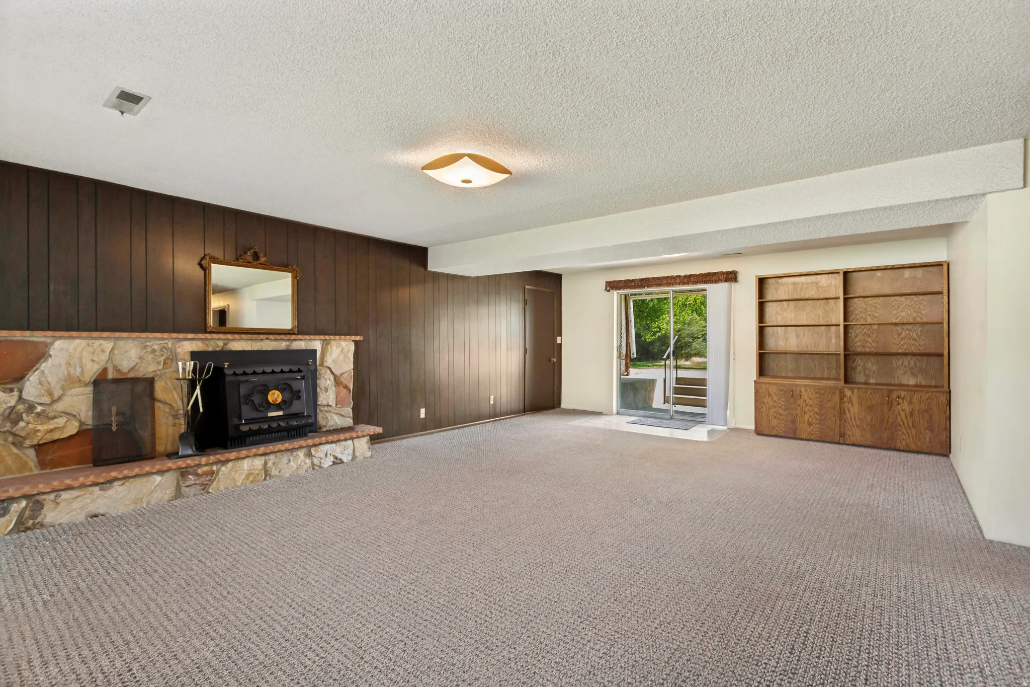 Basement living room with walk out entrance.