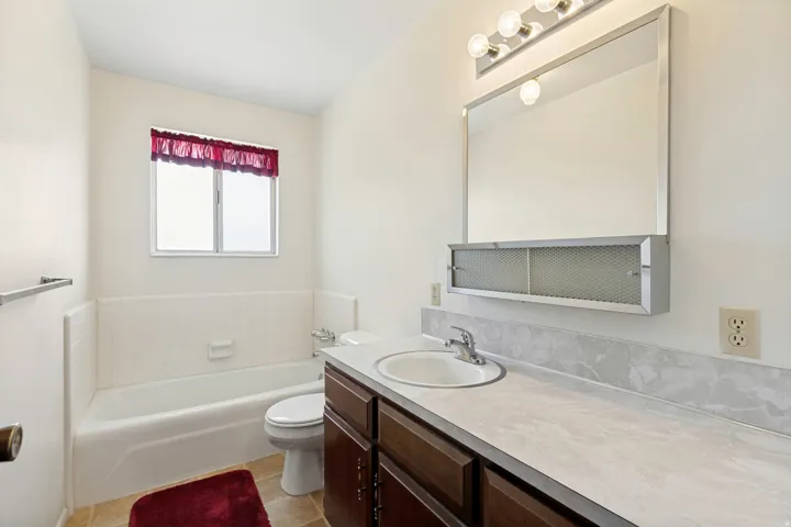Hallway bath on first level.
