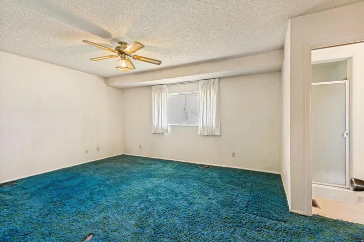 Primary Bedroom with private 3/4 bathroom.