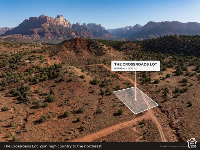 Aerial: The Crossroads Lot (R-1308-4) with Zion National Park's high country on the horizon