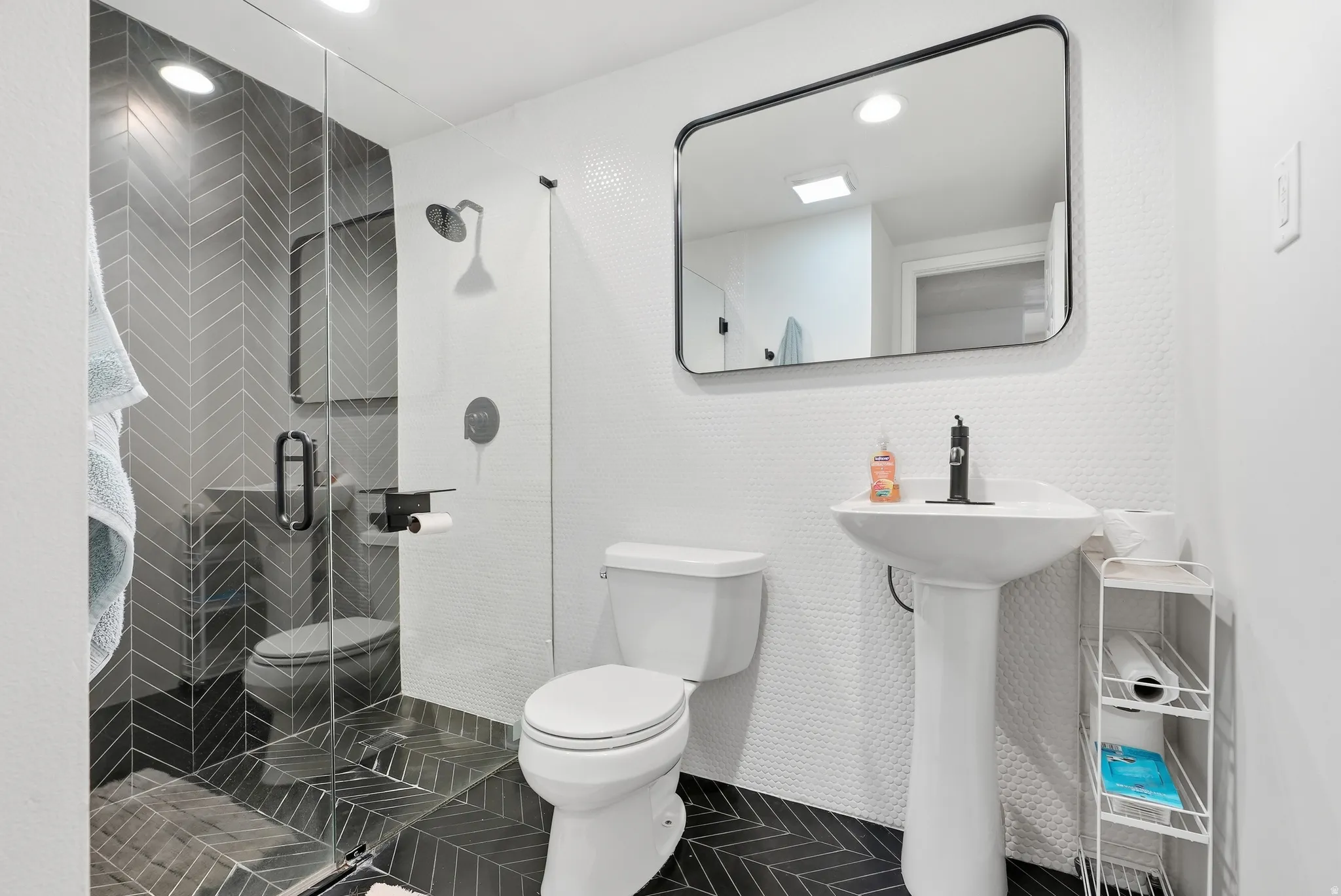 4 Bedrooms, 3.5 bathrooms. With a bonus space that can be used as a 5th Bedroom.