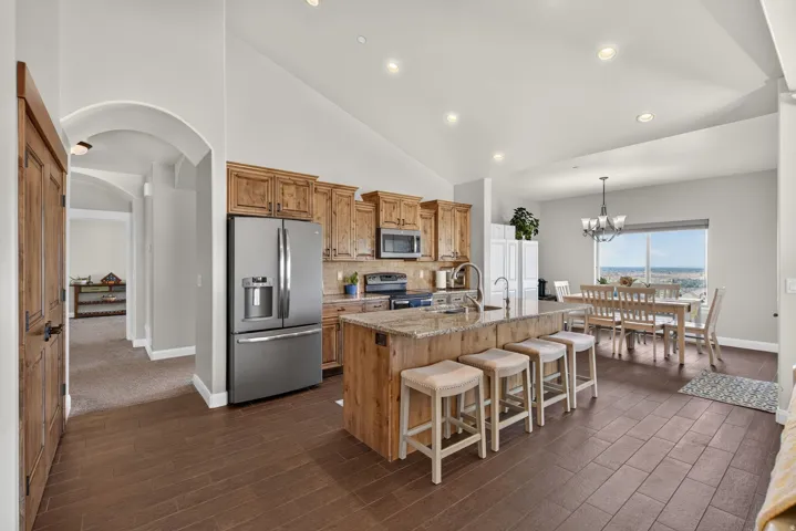 Wood-finish flooring, vaulted ceilings, and recessed lighting