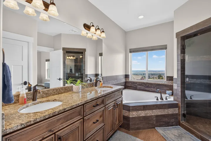 Dual vanity with granite countertops and undermount sinks