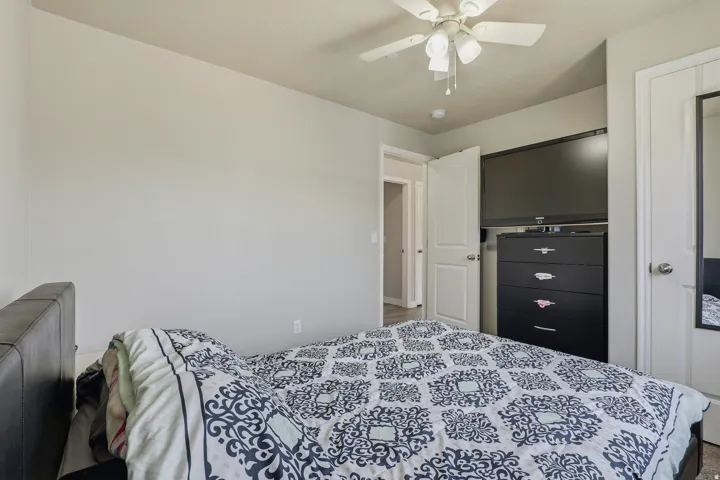 Recessed ceiling fan, light-toned walls, and white trim throughout
