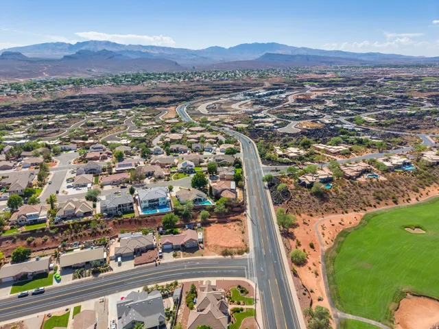 Residential development with paved roads and golf course access