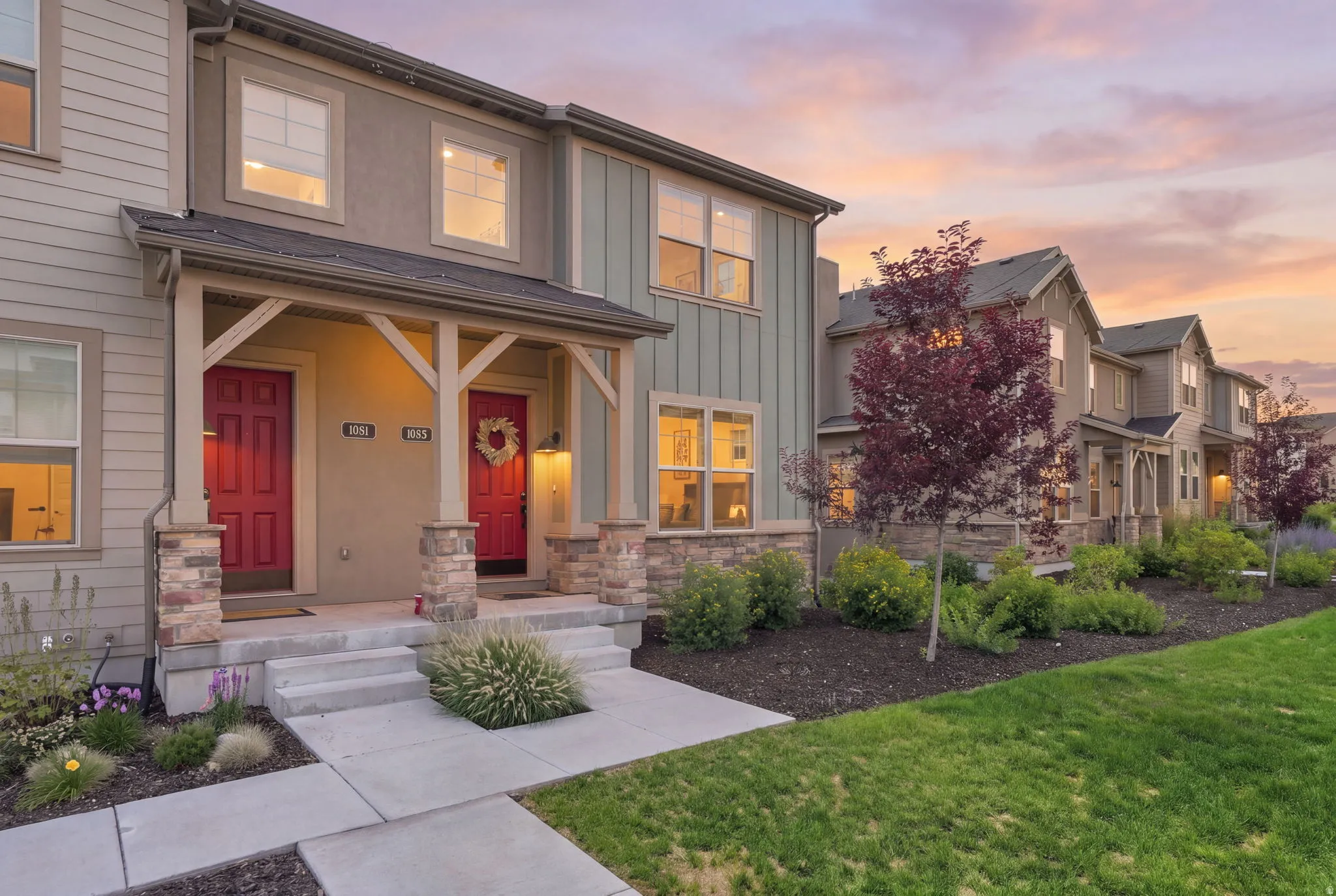 Property exterior featuring horizontal siding, vertical board siding, and stucco finishes