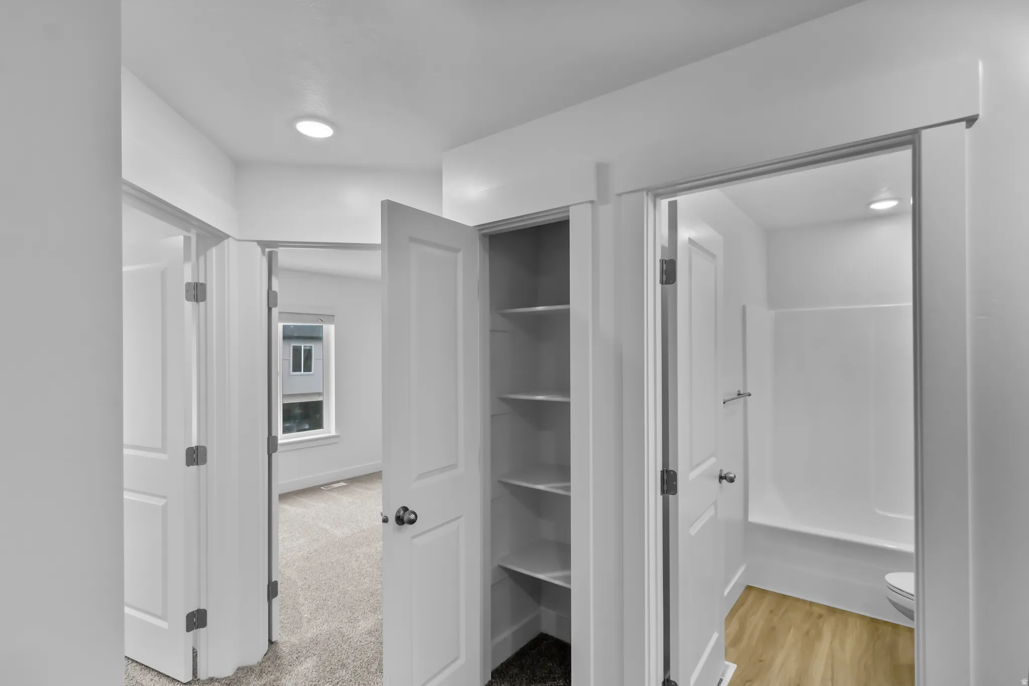Hallway with linen closet on the second floor
