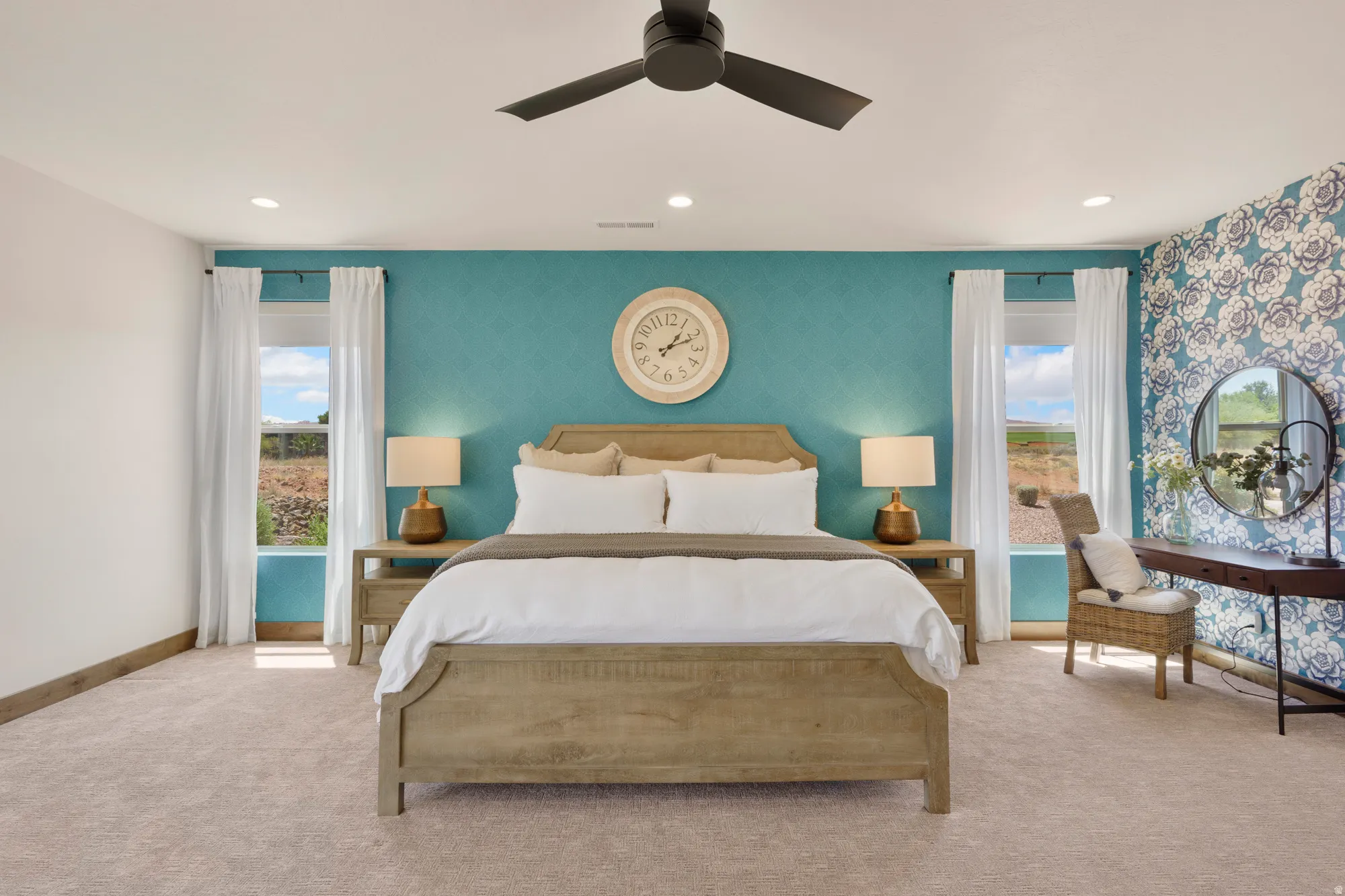 Recessed ceiling lighting, a ceiling fan, and carpeted flooring