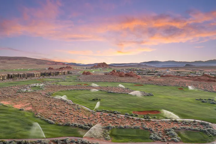 Expansive golf course with manicured greens and natural desert landscaping