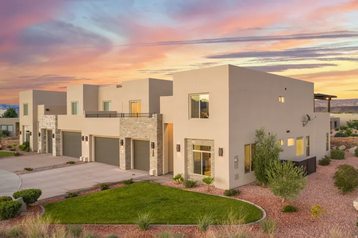 Contemporary stucco exterior with stone accents