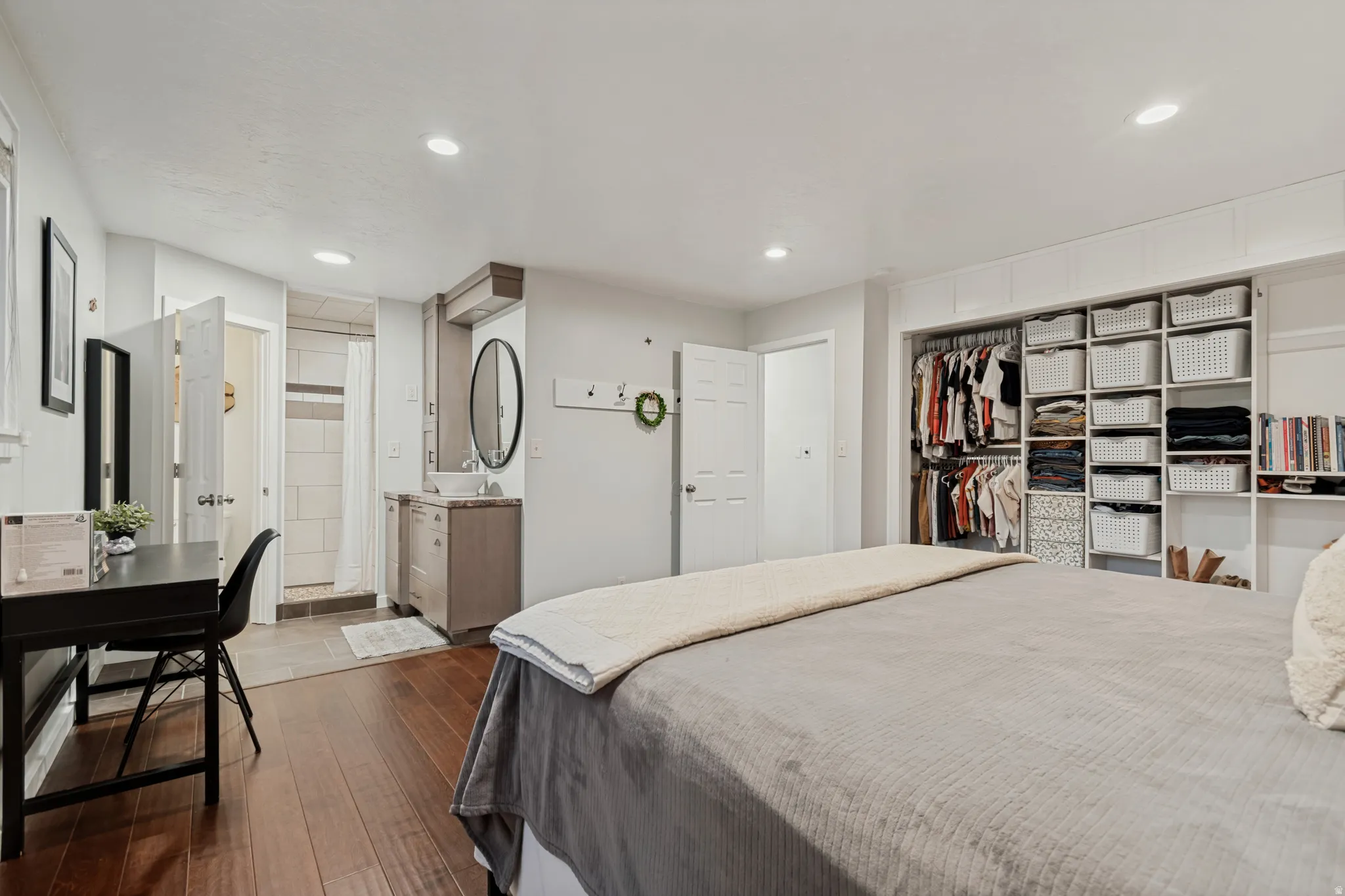Hardwood-finish flooring extending into the room