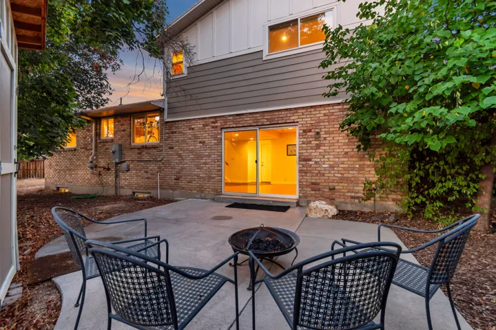 Concrete patio with direct access to sliding glass doors