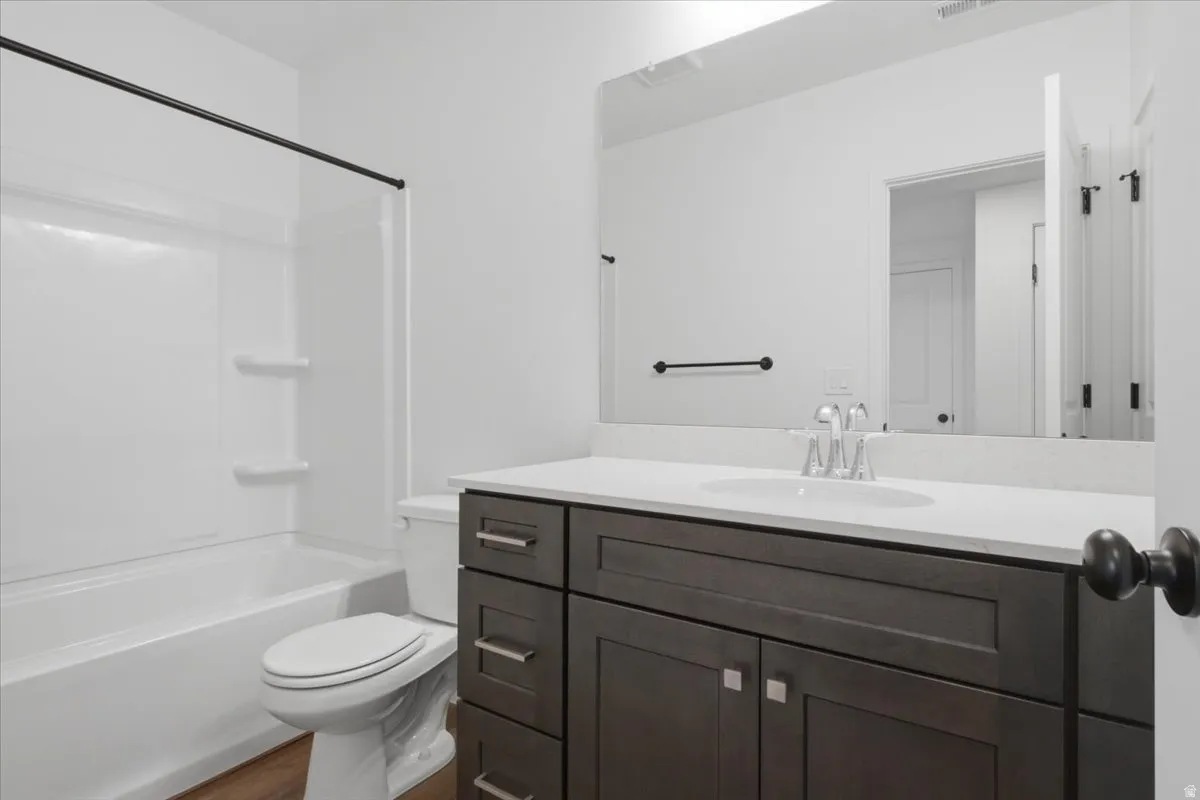 ADU bathroom with large storage closet.