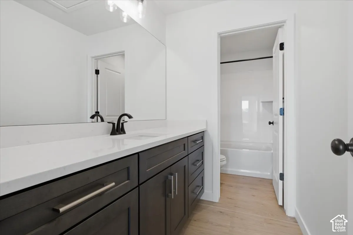 Large 2nd Bath Upstairs with a Vanity w/ Space to Spare!  Separate Shower/Tub allows for ease of sharing the space.