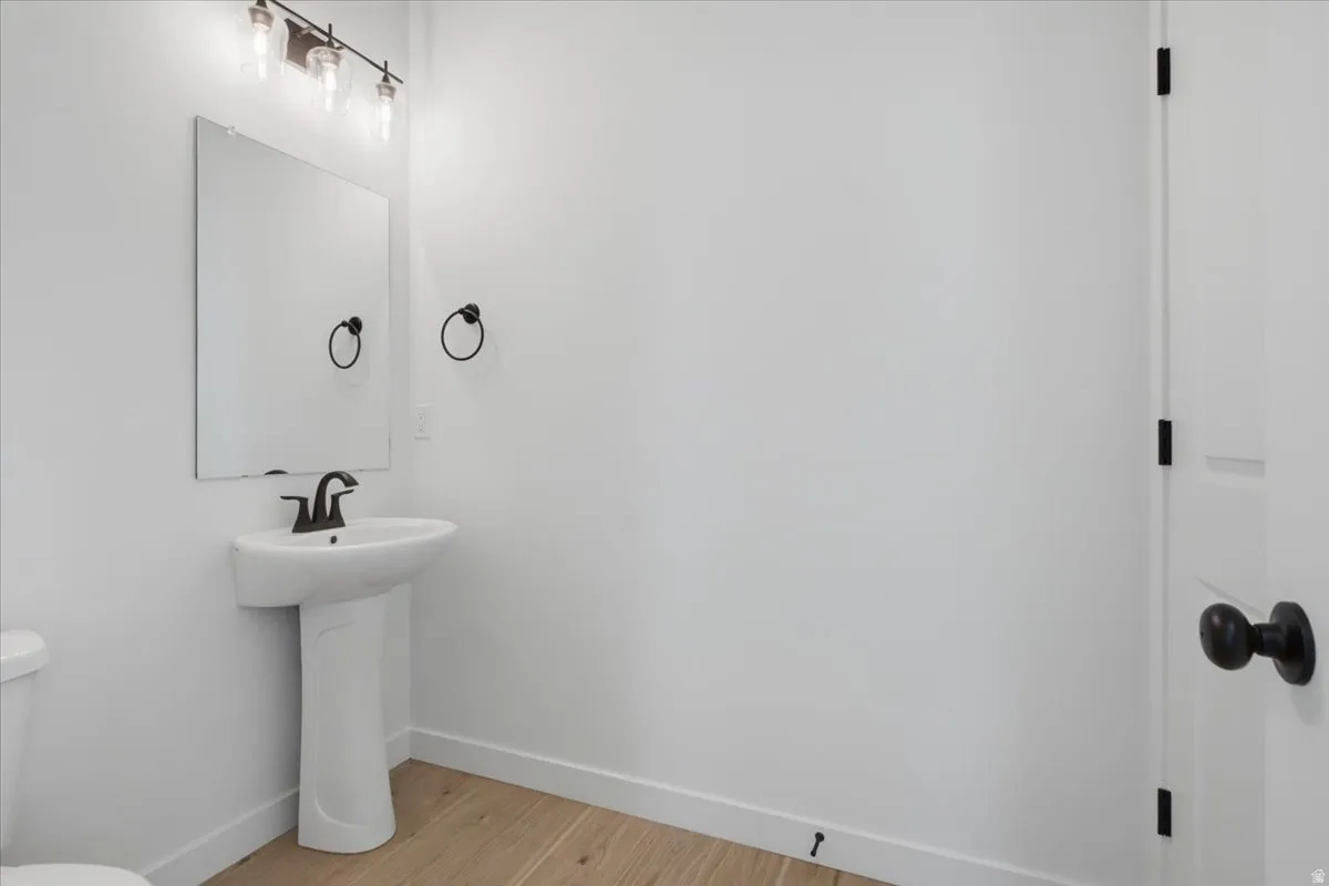 1/2 bath with HUGE STORAGE CLOSET!  Plenty of room for all the essentials.