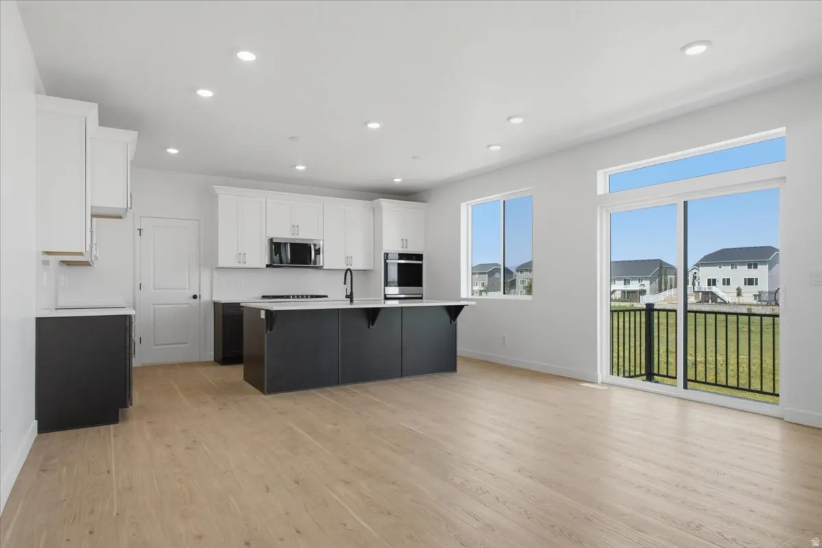 Kitchen with a plethora of cabinets and a huge  butler's pantry.