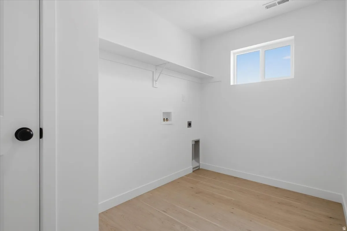 Laundry with Large Storage Closet.
