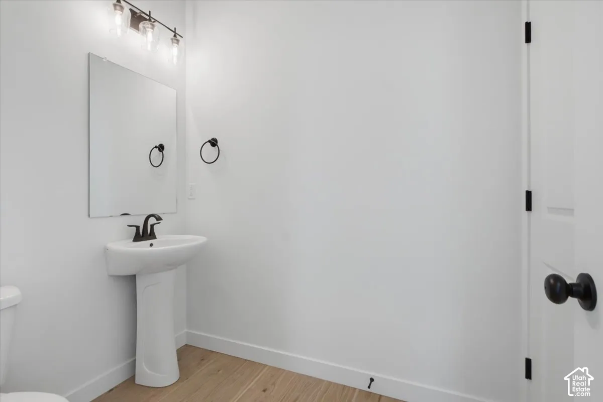 1/2 bath with HUGE STORAGE CLOSET!  Plenty of room for all the essentials.