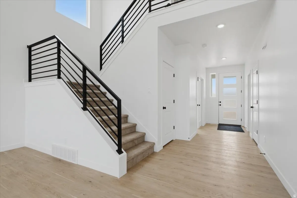 Modern Railing and Vaulted Family Room